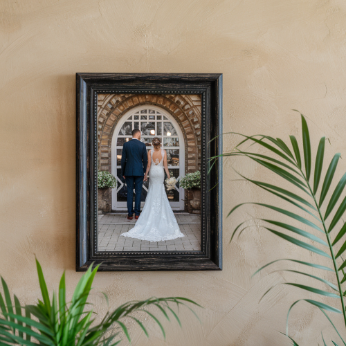 a-photo-of-a-framed-wedding-photo-print-on-the-wal-Jqz6UKLCRaeBxw_Rh2la_A-3MAKSkQJSvOBZ6ZTepG0cA.png
