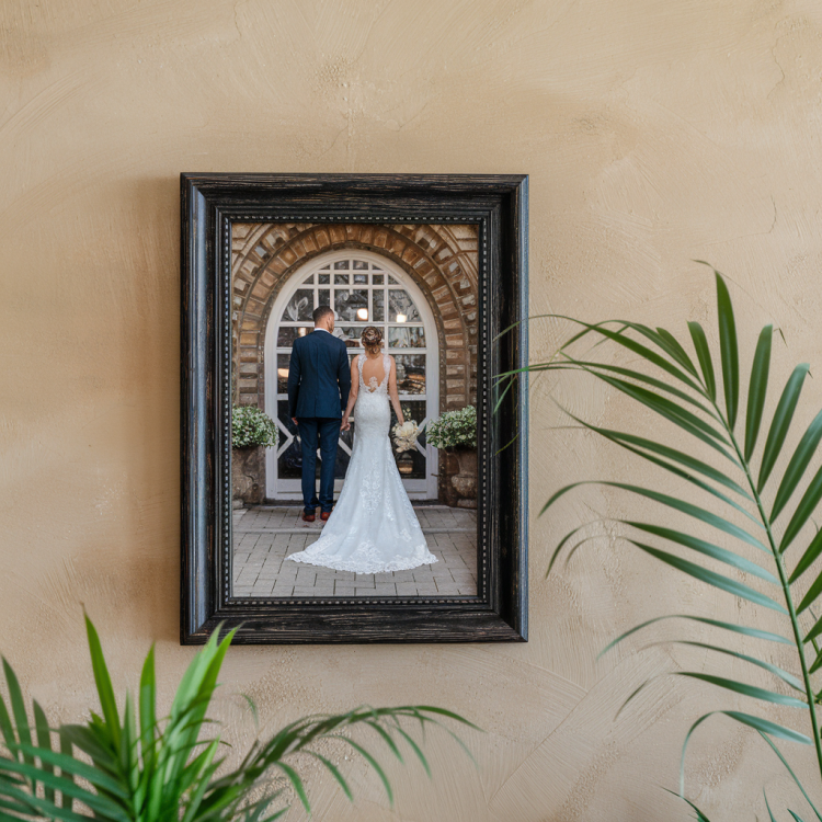 a-photo-of-a-framed-wedding-photo-print-on-the-wal-Jqz6UKLCRaeBxw_Rh2la_A-3MAKSkQJSvOBZ6ZTepG0cA.png
